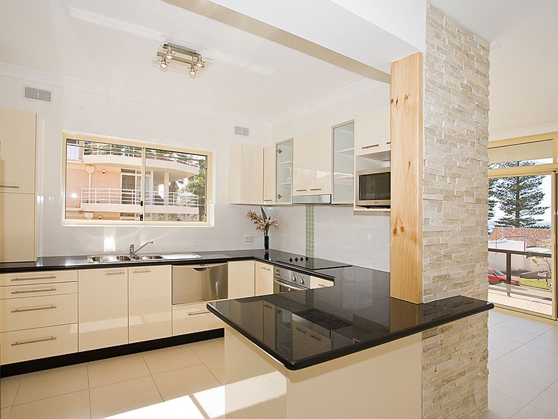 Stone Benchtops kitchen sydney by Paradise Kitchens